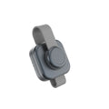 Three-in-one magnetic wireless charger stand in dark grey with a smartphone, watch, and earphones placed on it
