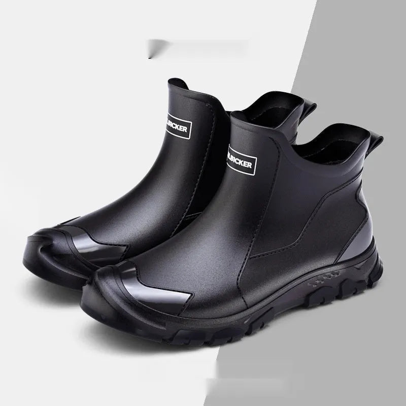 PVC outdoor wading boots in beige and black with red, showing round toe and non-slip plastic sole.