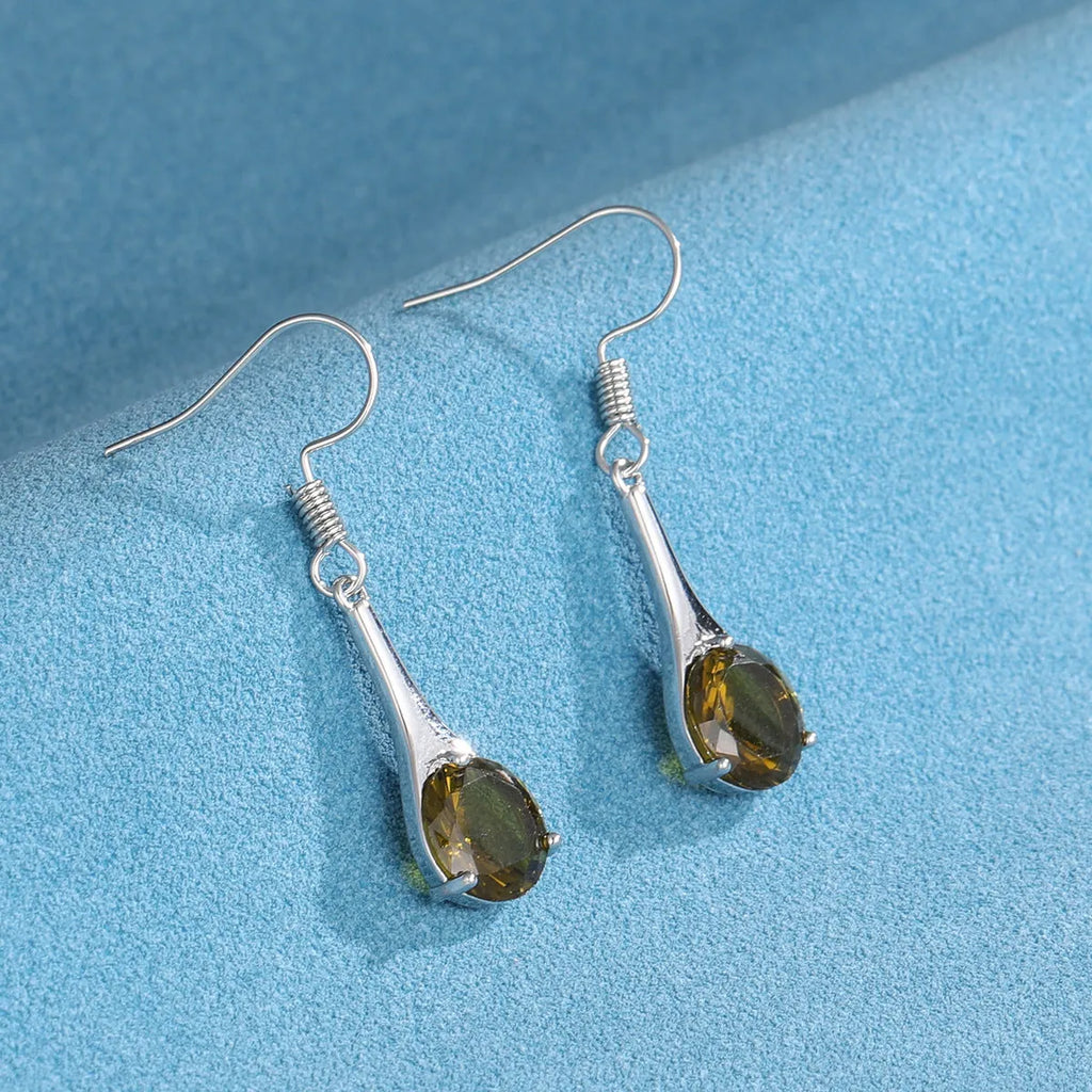 Olive green water drop shaped retro earrings with minimalist design on alloy base