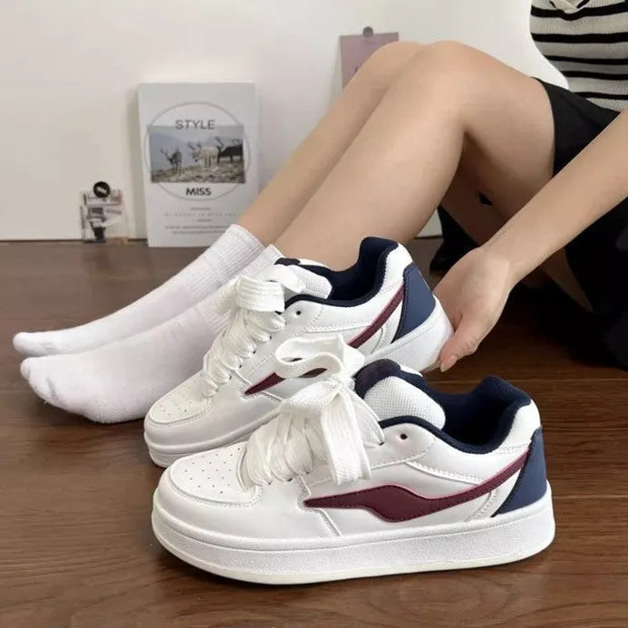 Women's low top mid heel pump shoes in synthetic leather, available in pink colour, side view