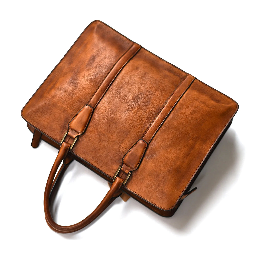 Men's horizontal leather handbag in vegetable tanned cowhide with 14 inch laptop compartment