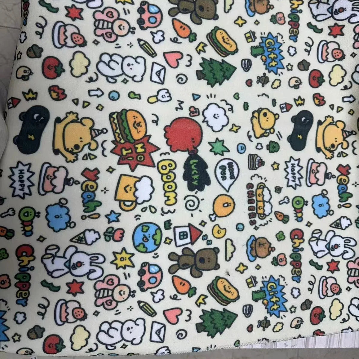 Nylon cosmetic bag with cartoon cat print in blue puppy design, shown in large, medium, and small sizes.