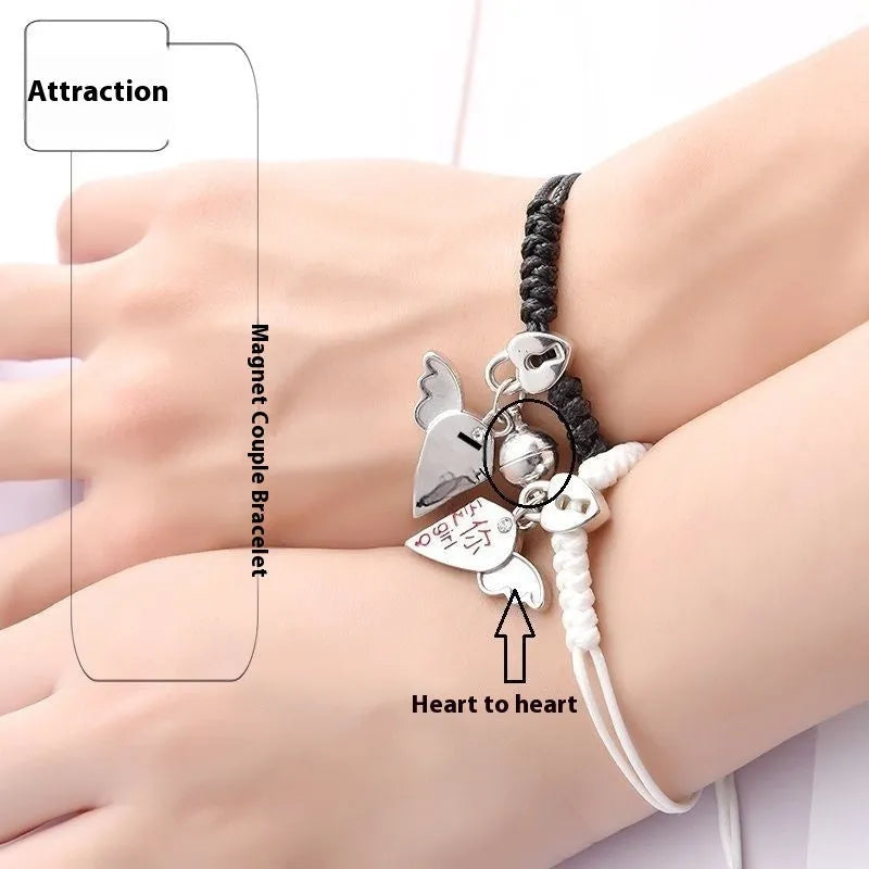Magnetic clasp couple bracelets with alloy construction and symbolic designs including crown and love lock motifs.