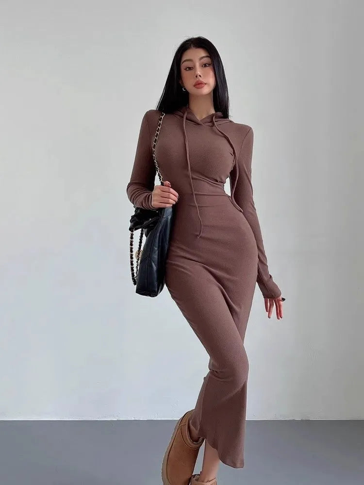 Women's grey hooded sheath dress with long sleeves and a high waist.