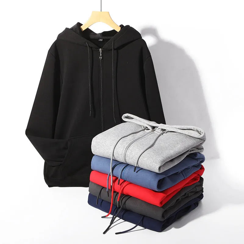 Man wearing a beige heavyweight cotton zip-up hooded cardigan with top-stitched pockets.