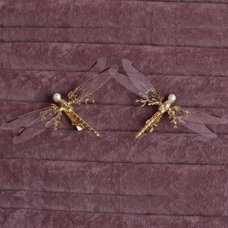 Golden dragonfly-shaped side clip headdress for women's hair, made from alloy with an electroplated finish.