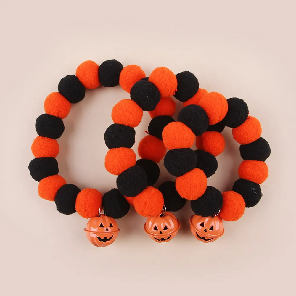Halloween pet collar with pumpkin design and reflective elements for dogs and cats