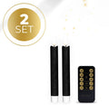 Four black LED taper candles with realistic flickering flame effects