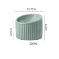 Ceramic elevated cat bowl in round tilted design with raised height for indoor cats