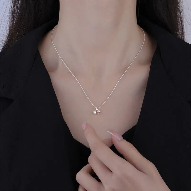 Adjustable silver cherry necklace with snake bone chain and fruit pendant