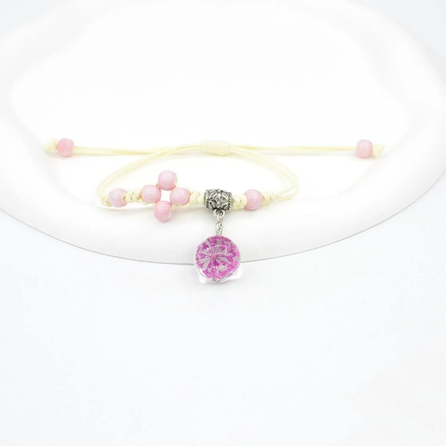 Women's hand-woven glass dried flower bracelet with large 1.4 cm beads in multiple colour options.
