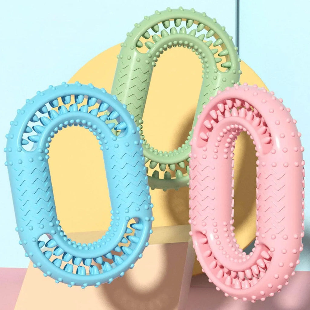 Blue O-ring shaped dog chew toy for aggressive chewers and dental health on a plain background.
