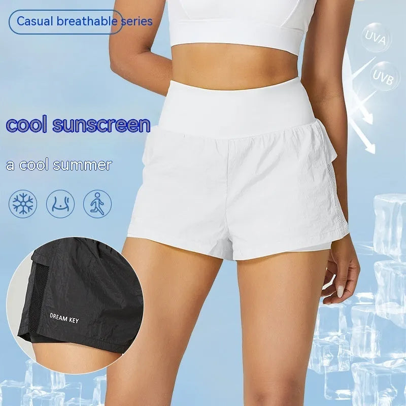 Women's loose fit cotton blend fitness shorts in lemon yellow colour on a hanger