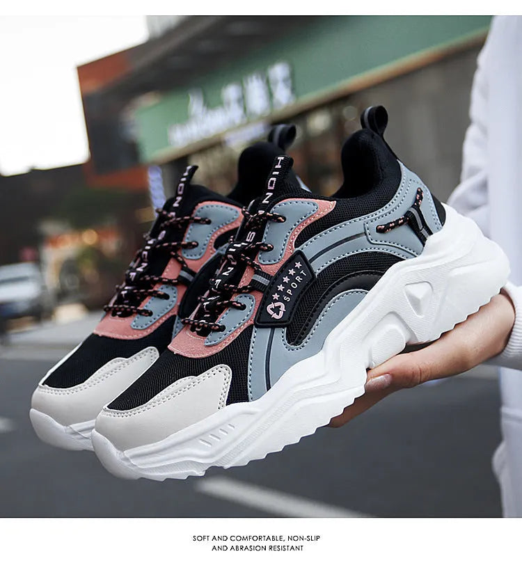 Women's white mesh casual sports shoes with thick PU sole, buckle detail, and a middle heel.