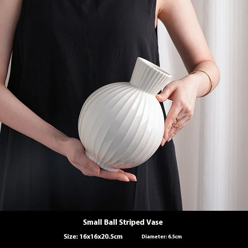 White ceramic ball striped vase with American country styling for table centrepiece decoration
