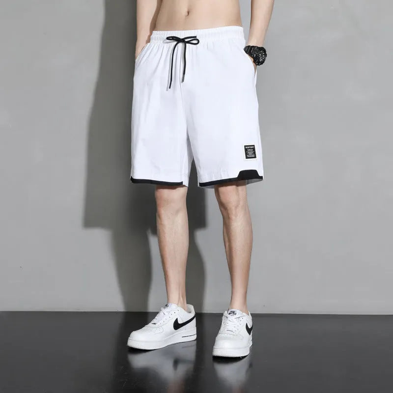 Boys' cotton shorts in black, shown in a casual style for summer home and sports wear.