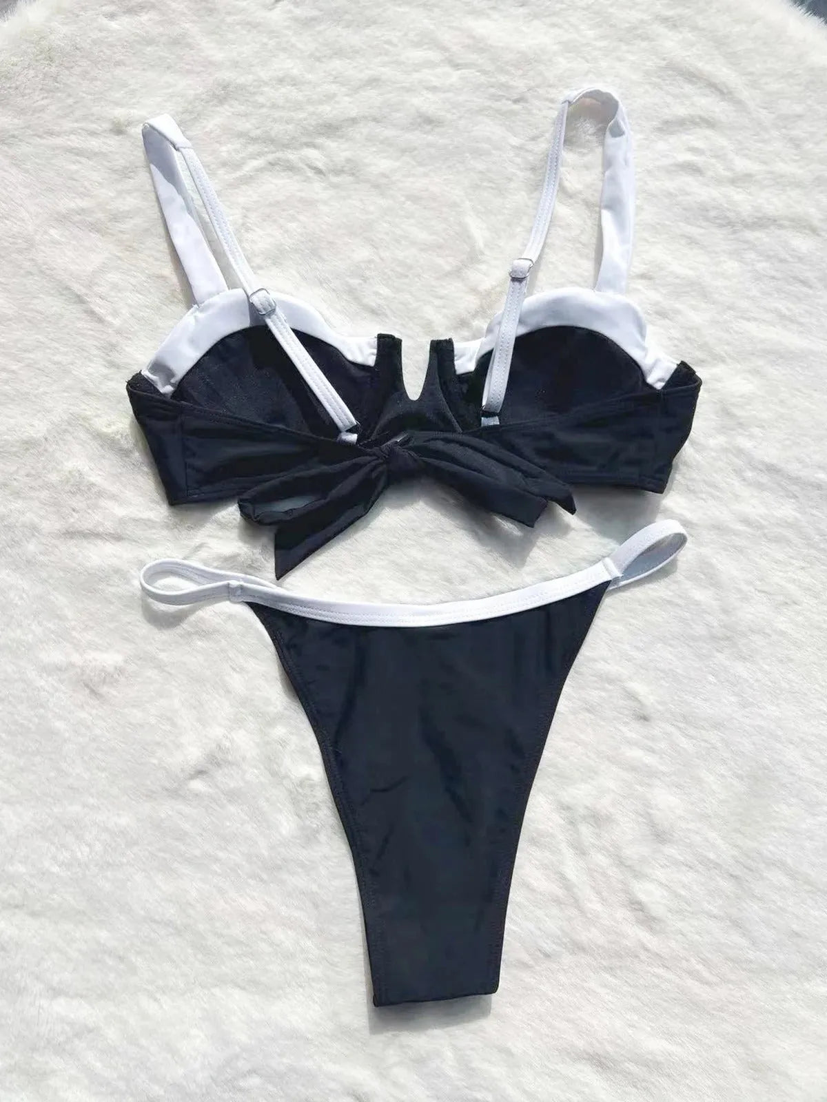 Black low waist women's bikini swimsuit with stitching split detail on briefs