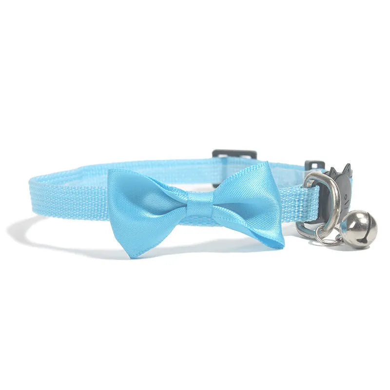 Striped multi-colour adjustable nylon cat collar with a small bell attached.