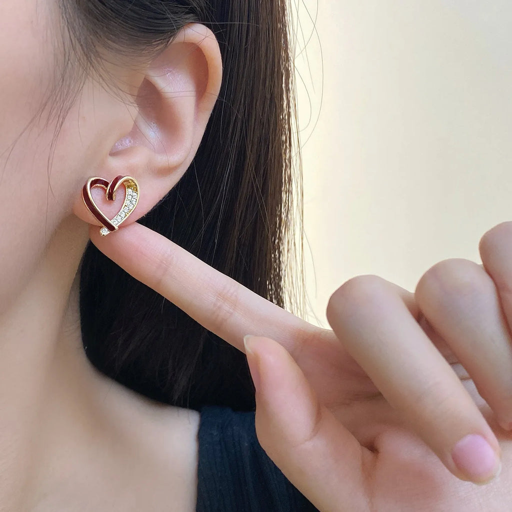 Micro-set zircon asymmetric heart earrings for women, copper base, white colour, ear clip style