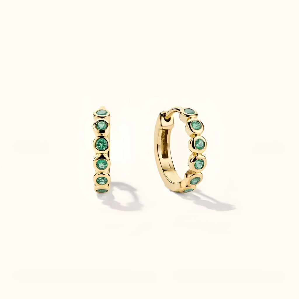 Gold S925 sterling silver geometric stud earrings with inlaid zircon on a white background