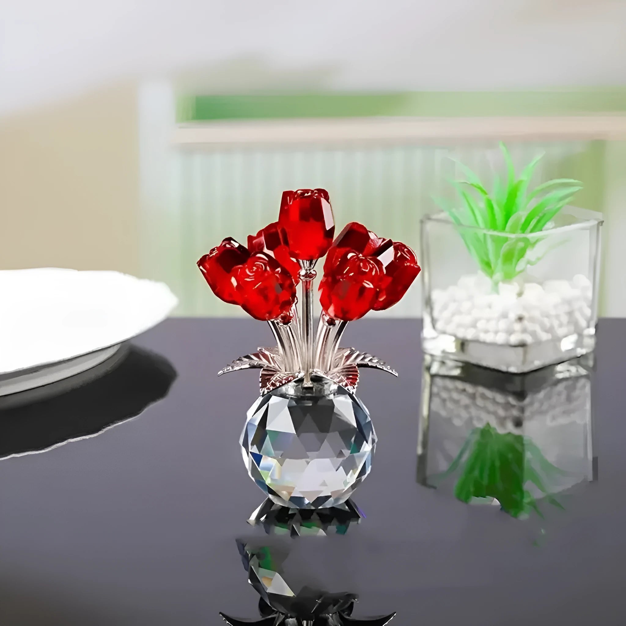 Geometric crystal glass rose ornament in red colour on wooden surface