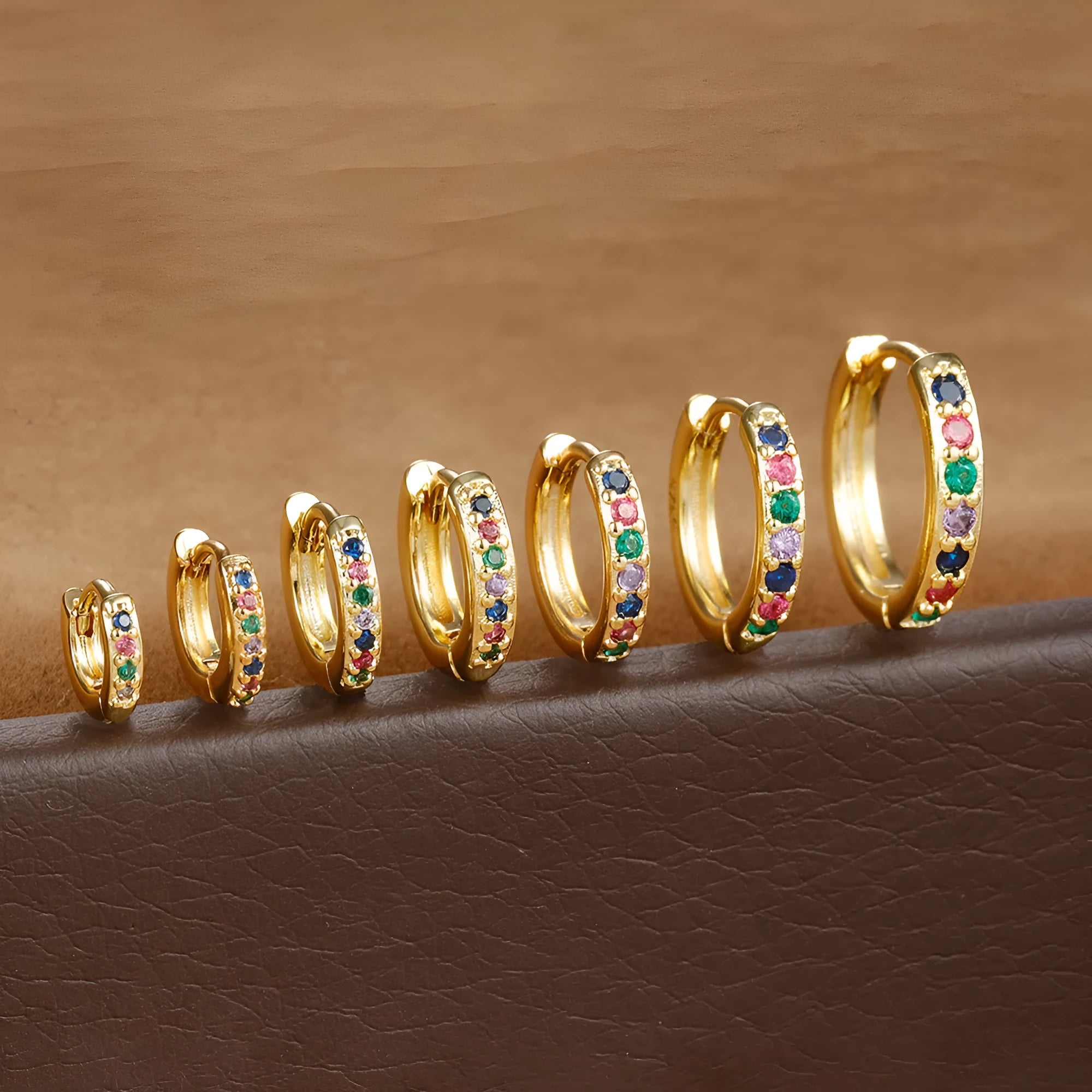 Circle zircon perforated stud earrings in gold, rose gold, and silver colour options with geometry round design