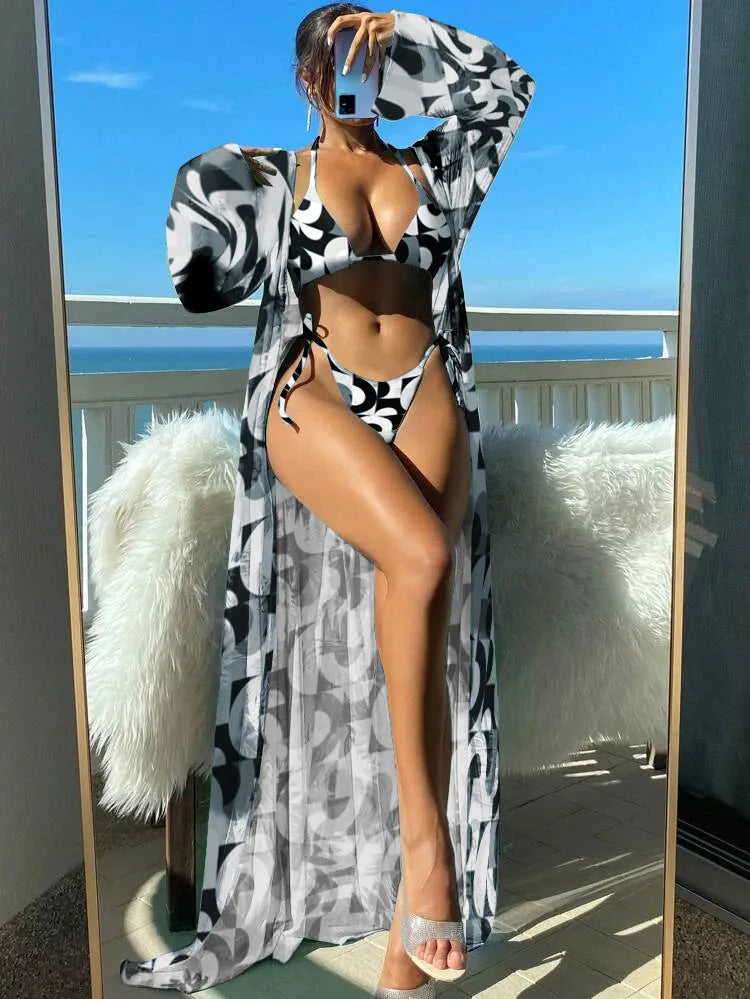 Women's floral print banded bikini set with long sleeve robe cover-up in blue colour