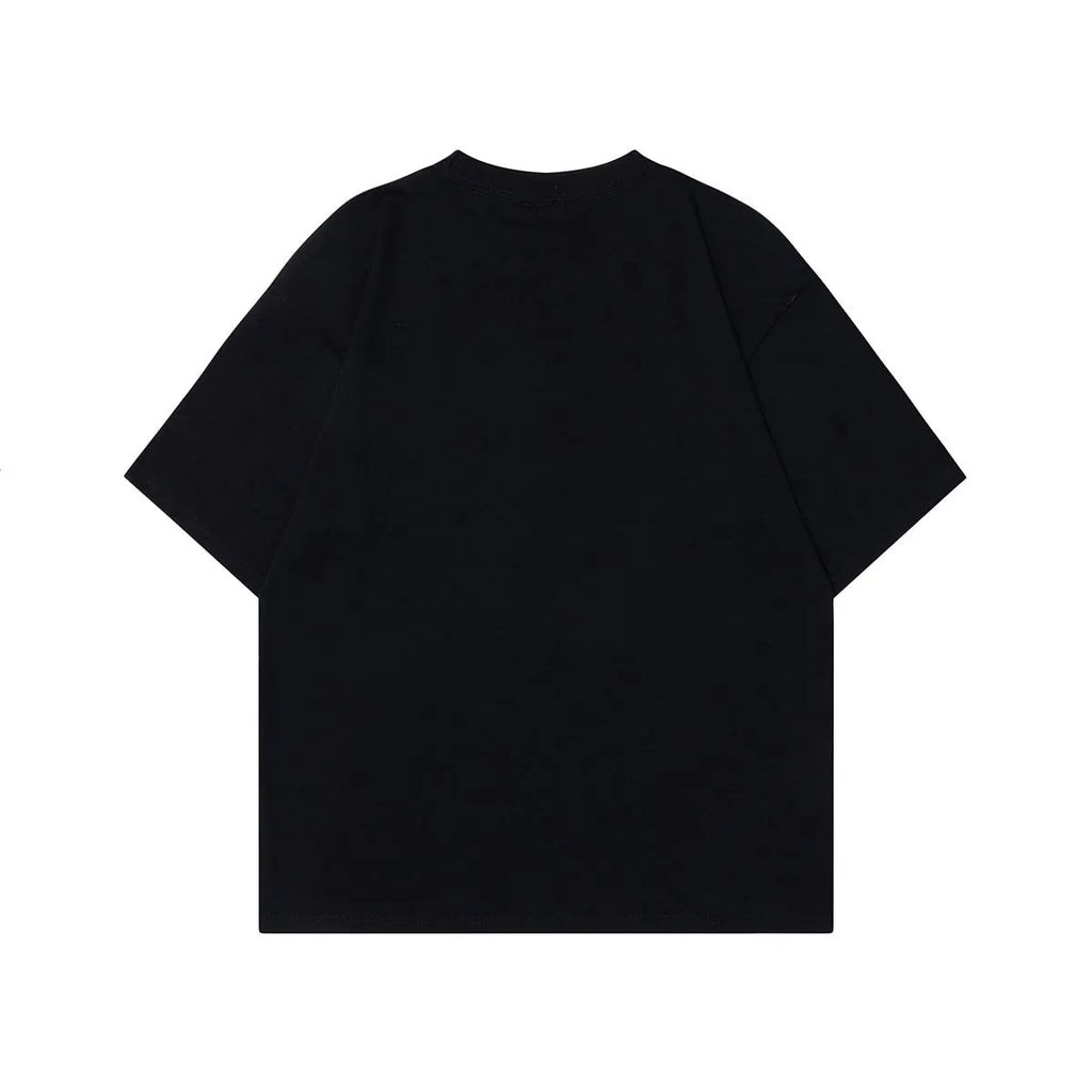 Men's grey loose-fit cotton T-shirt featuring a printed retro character design on the chest.