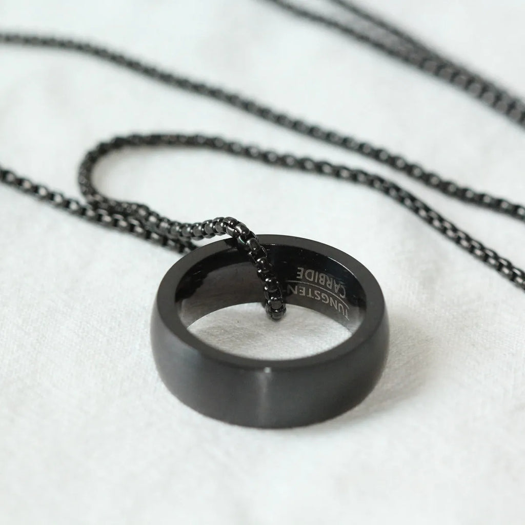 Men's silver pearl chain circle pendant necklace with stainless steel chain and titanium steel pendant on neutral background