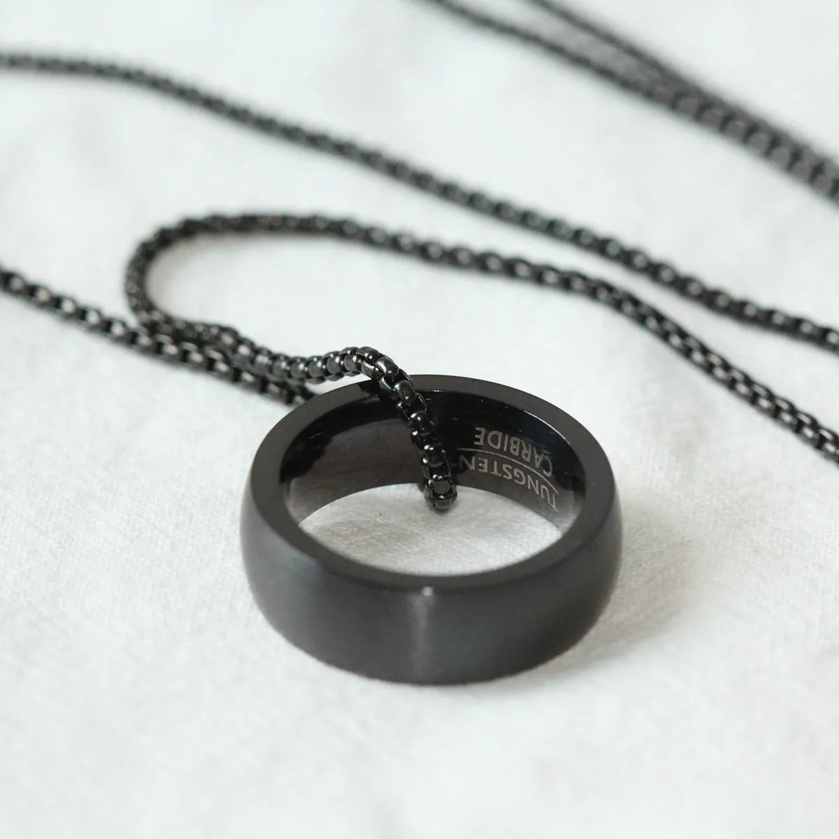 Men's silver pearl chain circle pendant necklace with stainless steel chain and titanium steel pendant on neutral background
