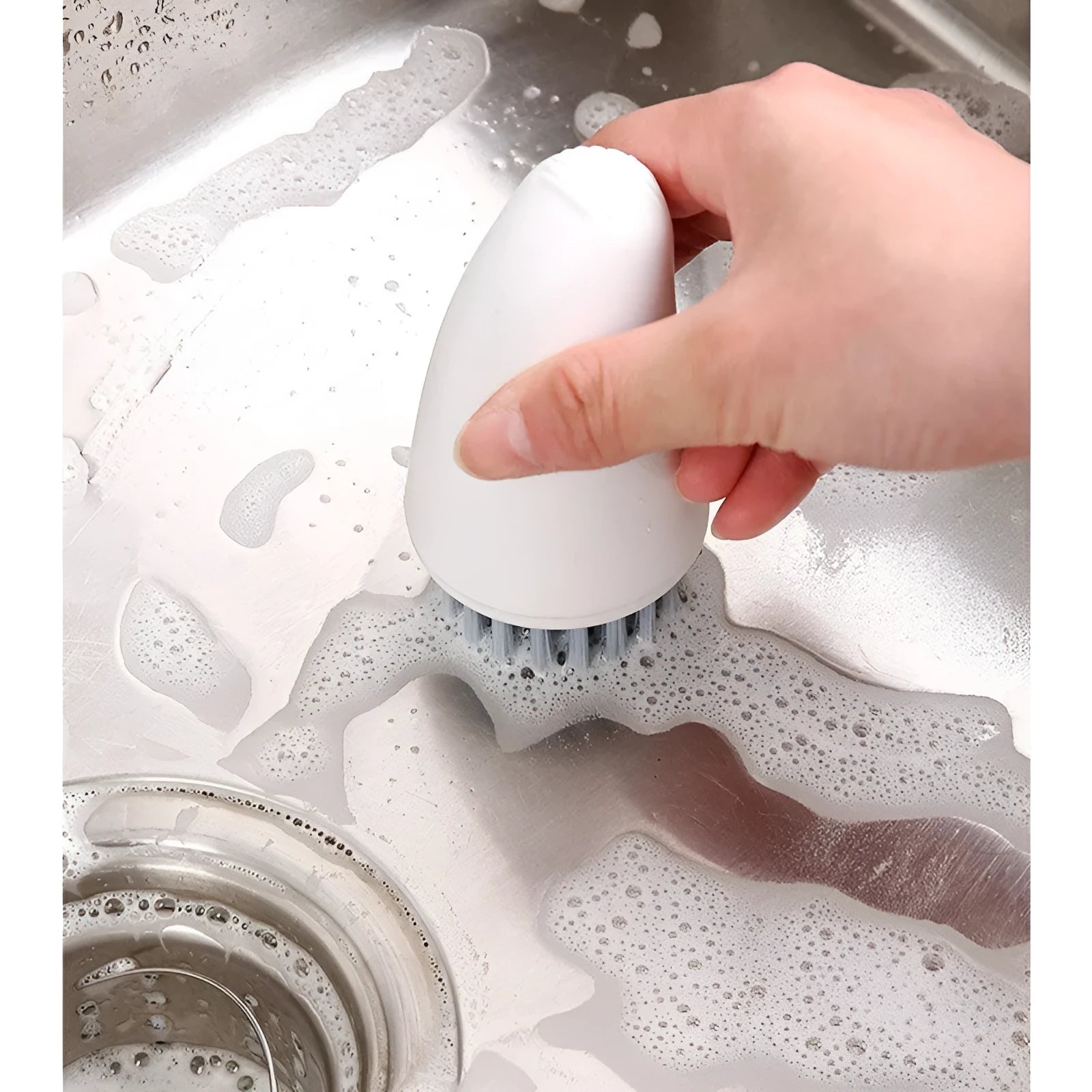 White and orange radish-shaped carrot cleaning brush with nylon bristles for washing root vegetables
