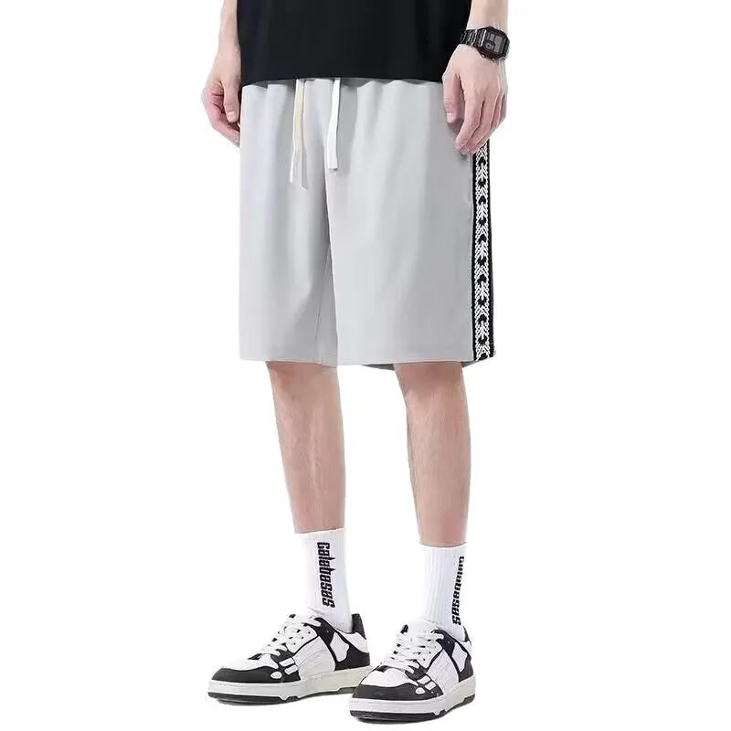 Men's black baggy track pants with micro elasticity in loose sports fit