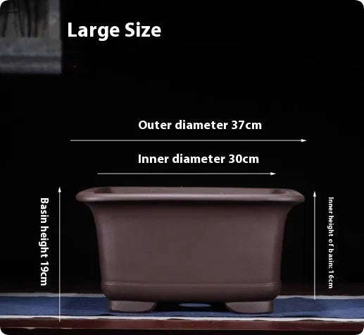 Large Chinese-style purple clay flower pot for indoor bonsai and plants.