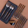 12-piece makeup brush set with wooden handles in PU storage roll