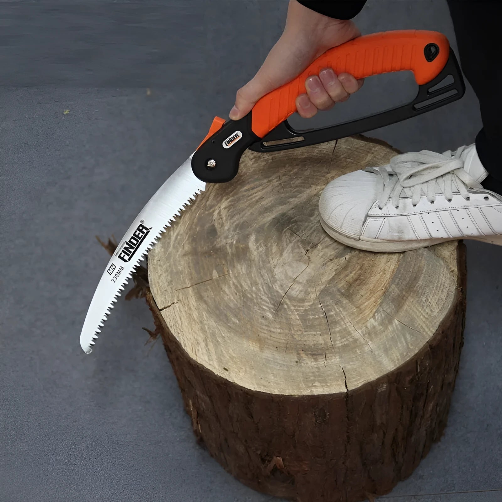 A folding garden hand saw with a black TPR grip and a silver 230mm steel blade, shown both open and closed.