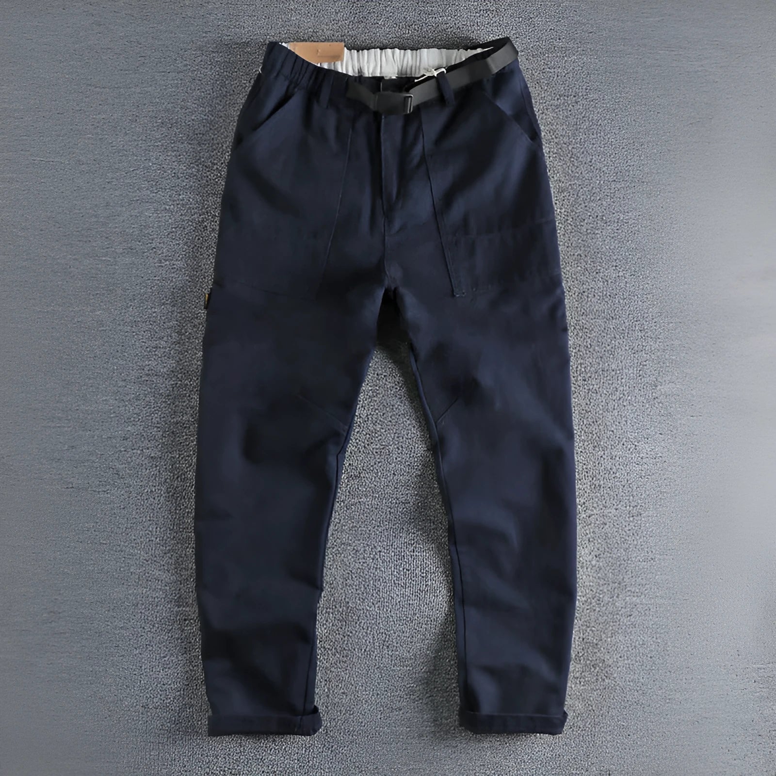 Men's khaki cotton work trousers with an adjustable N-I buckle belt on the waistband, shown with a 3D cut design.