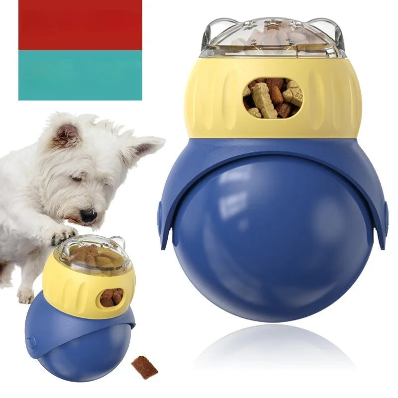 Yellow and blue owl-shaped plastic cat puzzle feeder with a food tumbler mechanism.