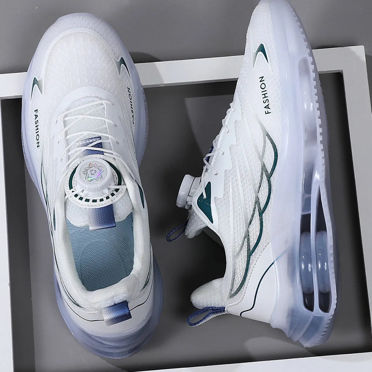 White men's casual running shoes with mesh upper, rotating button lace-up, and rubber sole.