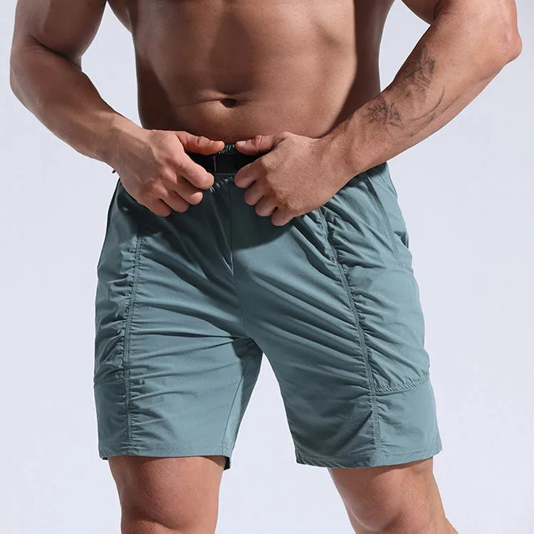 Men's athletic cargo shorts with pockets and elastic waistband in black color, mid-length cut