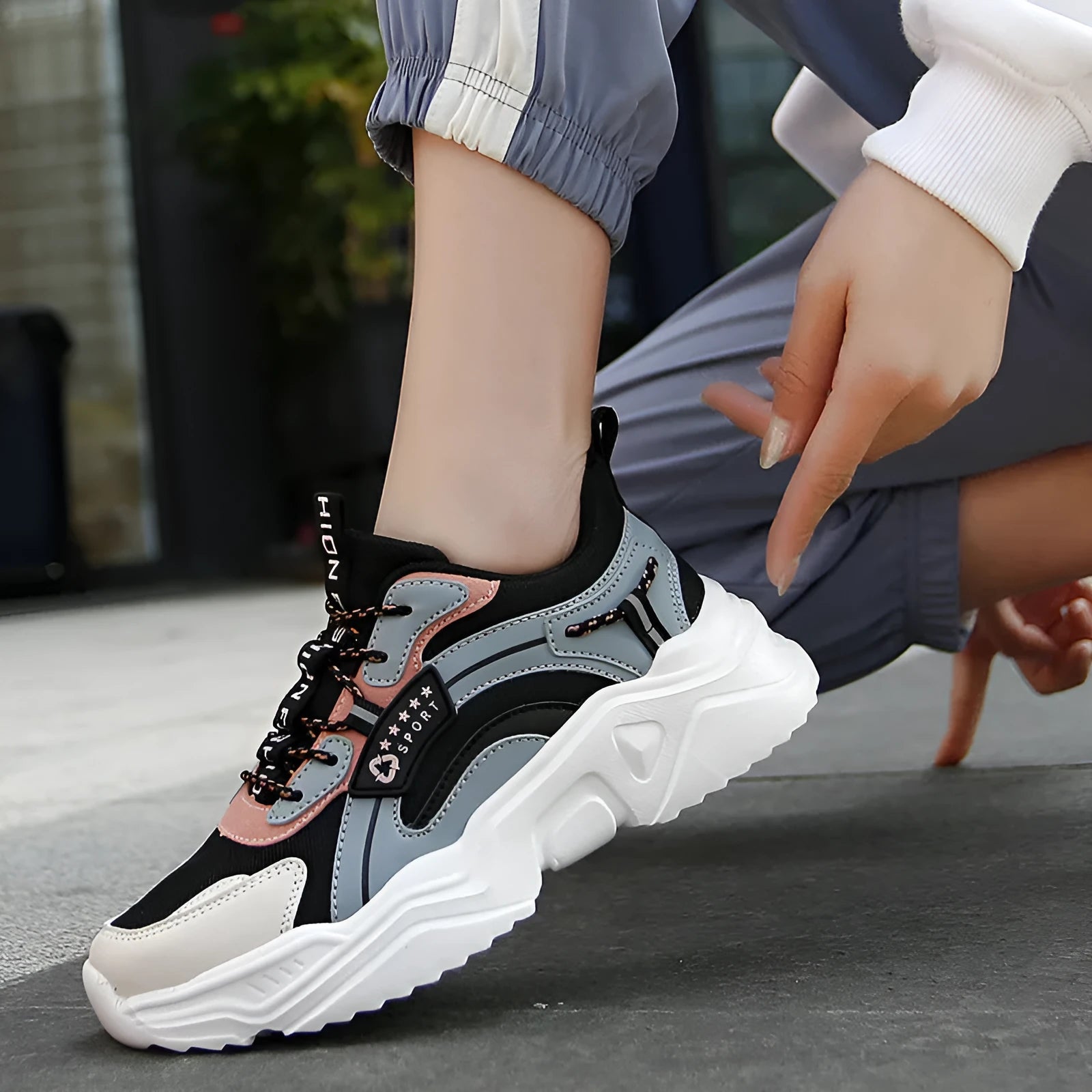Women's white mesh casual sports shoes with thick PU sole, buckle detail, and a middle heel.