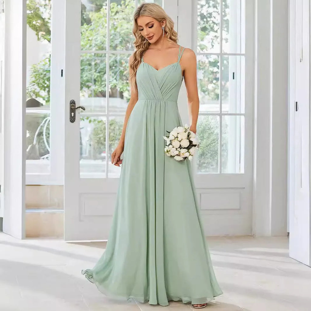 Women's long sleeveless A-line dress with pleated skirt in solid colour options