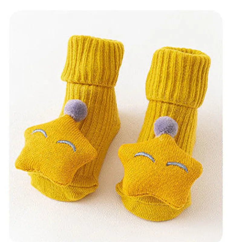 Cotton baby floor socks in various colours and patterns with size guide for ages 0-3 months