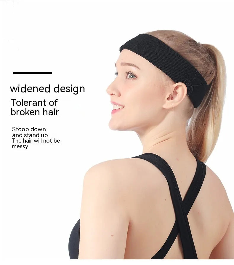 Elastic solid colour sports anti-sweat headband in blue on a white background.