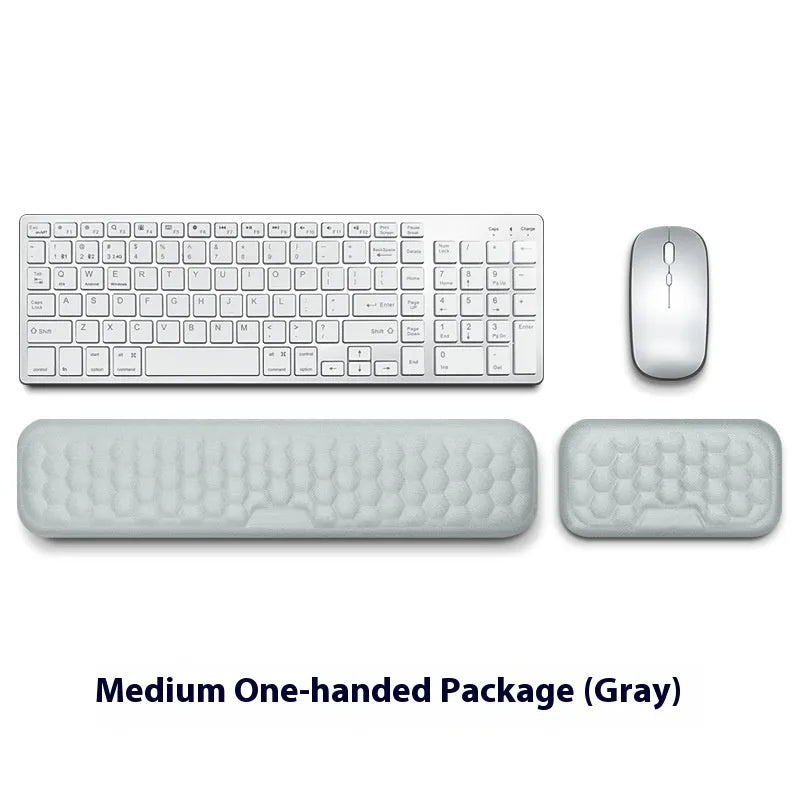 Memory foam mouse wrist rest with silicone base in black cloth and grey leather style options.