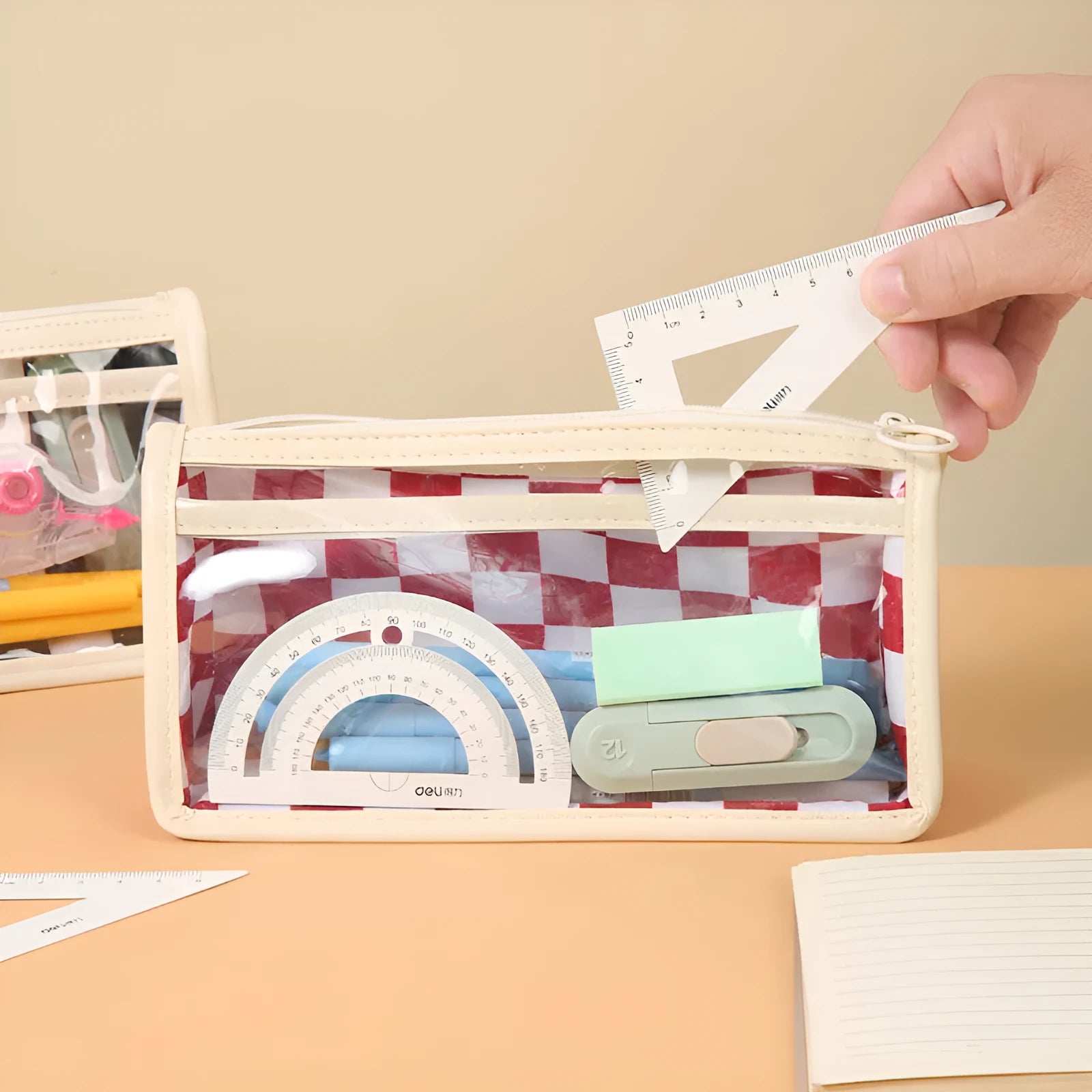 Transparent PVC pencil case with chessboard pattern in black and white grid design
