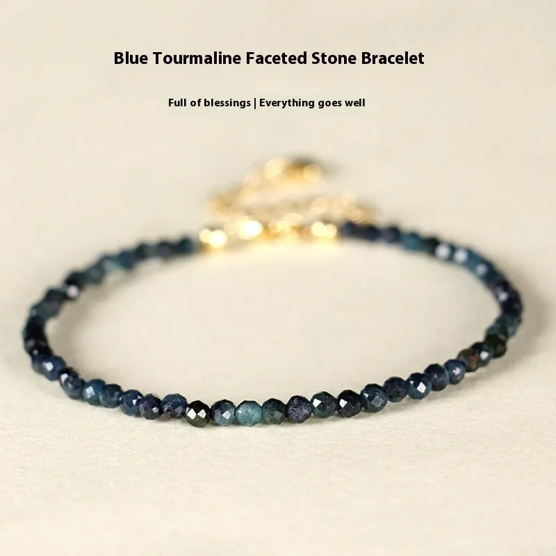 Blue tourmaline beaded bracelet with 3mm stones and silver spacer beads