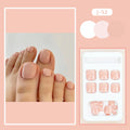Set of plastic skin-coloured glue-on toe nail stickers with adhesive.