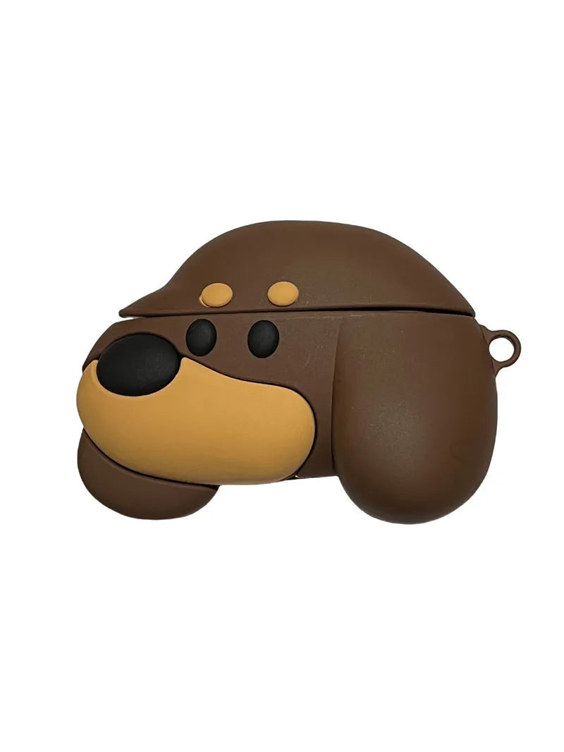 Brown puppy silicone earphone case on AirPods charging case with embossed cartoon design