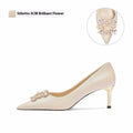 Crystal-embellished bridal high heels with pointed toe, available in stiletto or cat heel styles.