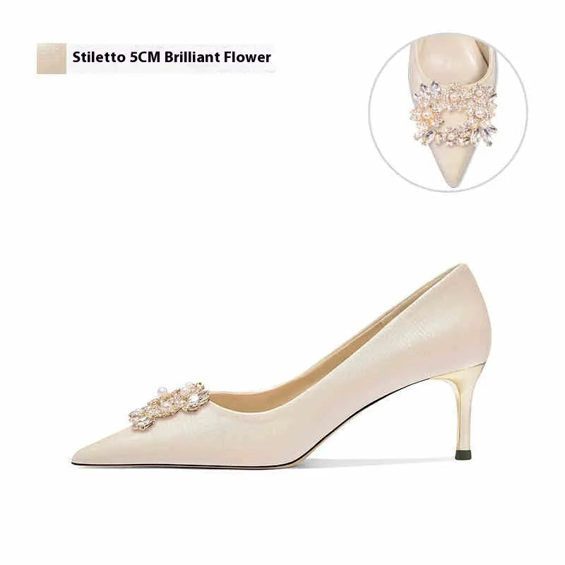 Crystal-embellished bridal high heels with pointed toe, available in stiletto or cat heel styles.